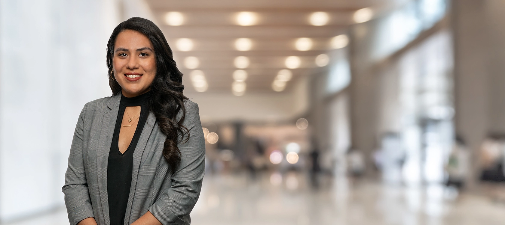 Professional portrait of Claudia P. Herrera