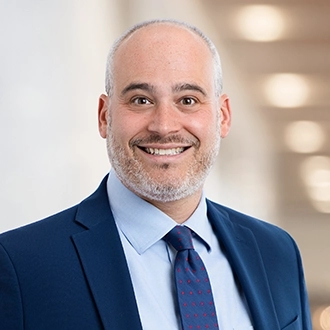 Adam E. Witkov