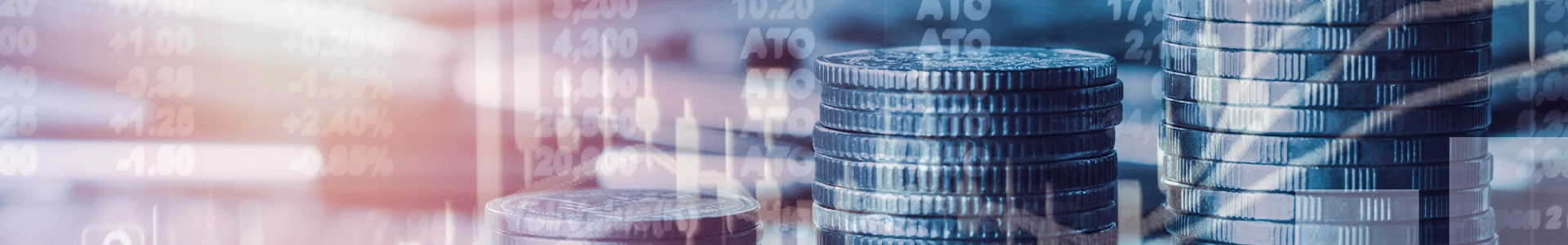 Stacks of coins in increasing height overlaid with financial charts and upward-trending graphs.